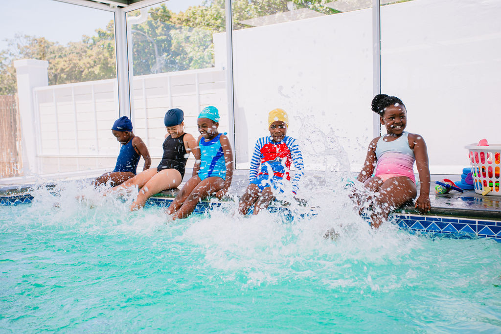 Learners enjoying swimming at Rising Stars Academy